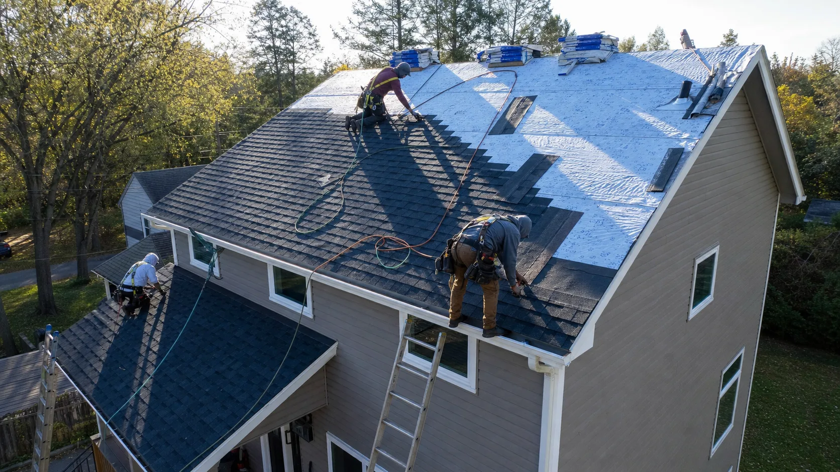 Professional roofing crew installing a new residential roof